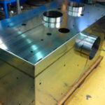 Fine sheet metal work for scientific projects, magnetic shielding for cryostat testing.